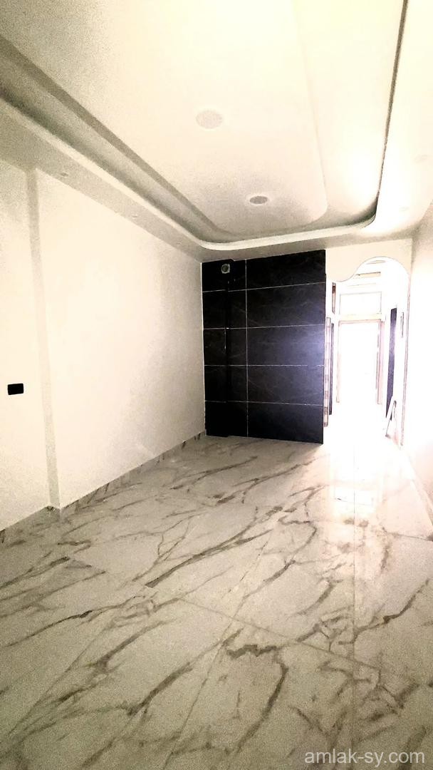 شقة للبيع 100 م جنوبية ببيلا سوق الشرائي على الشارع العام